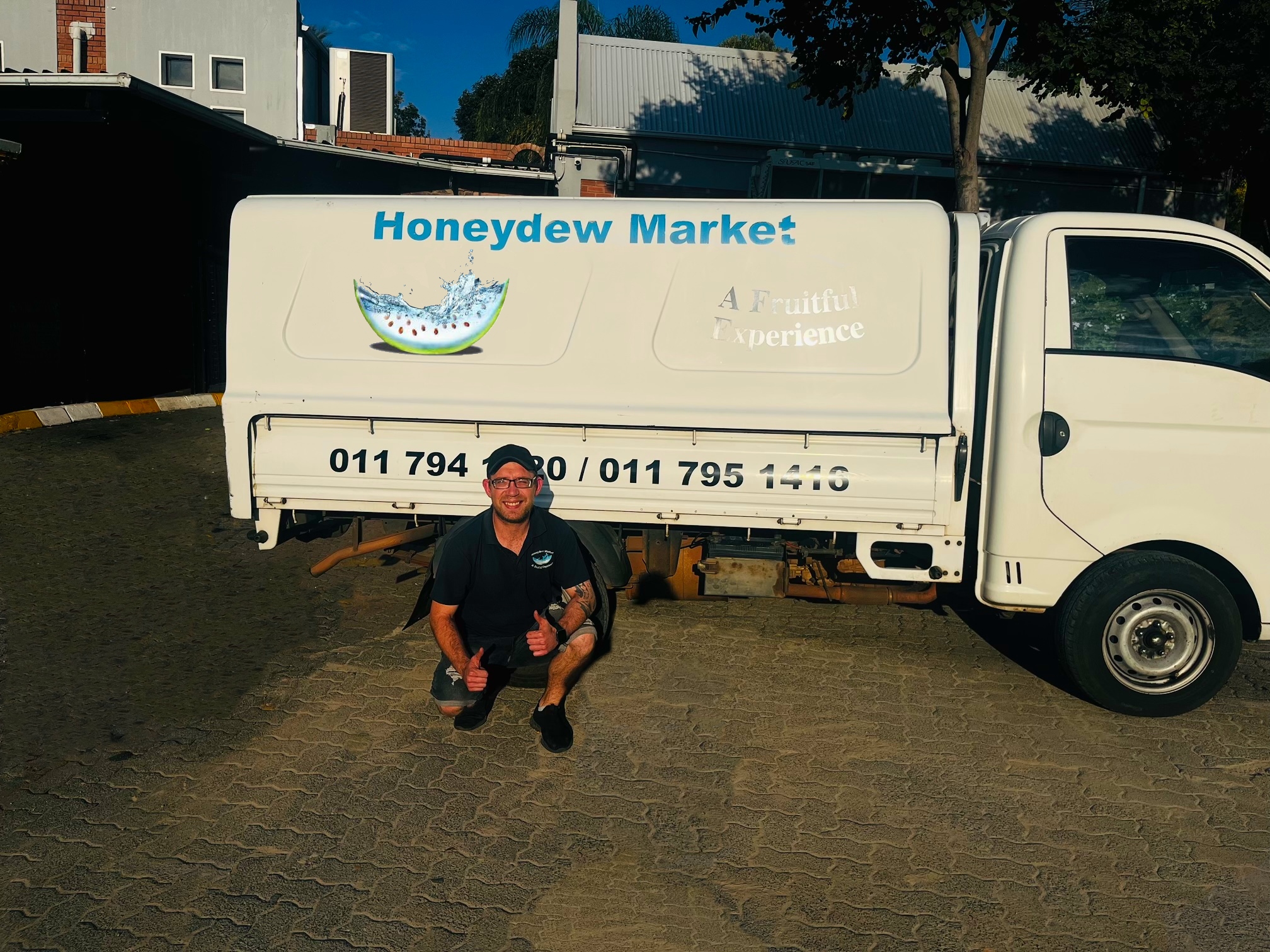 Honeydew Market business supply team and delivery vehicle
